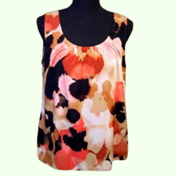 Chico's Tops - Chicos sleeveless silky top. Ivory, peach, and browns. Size 1.